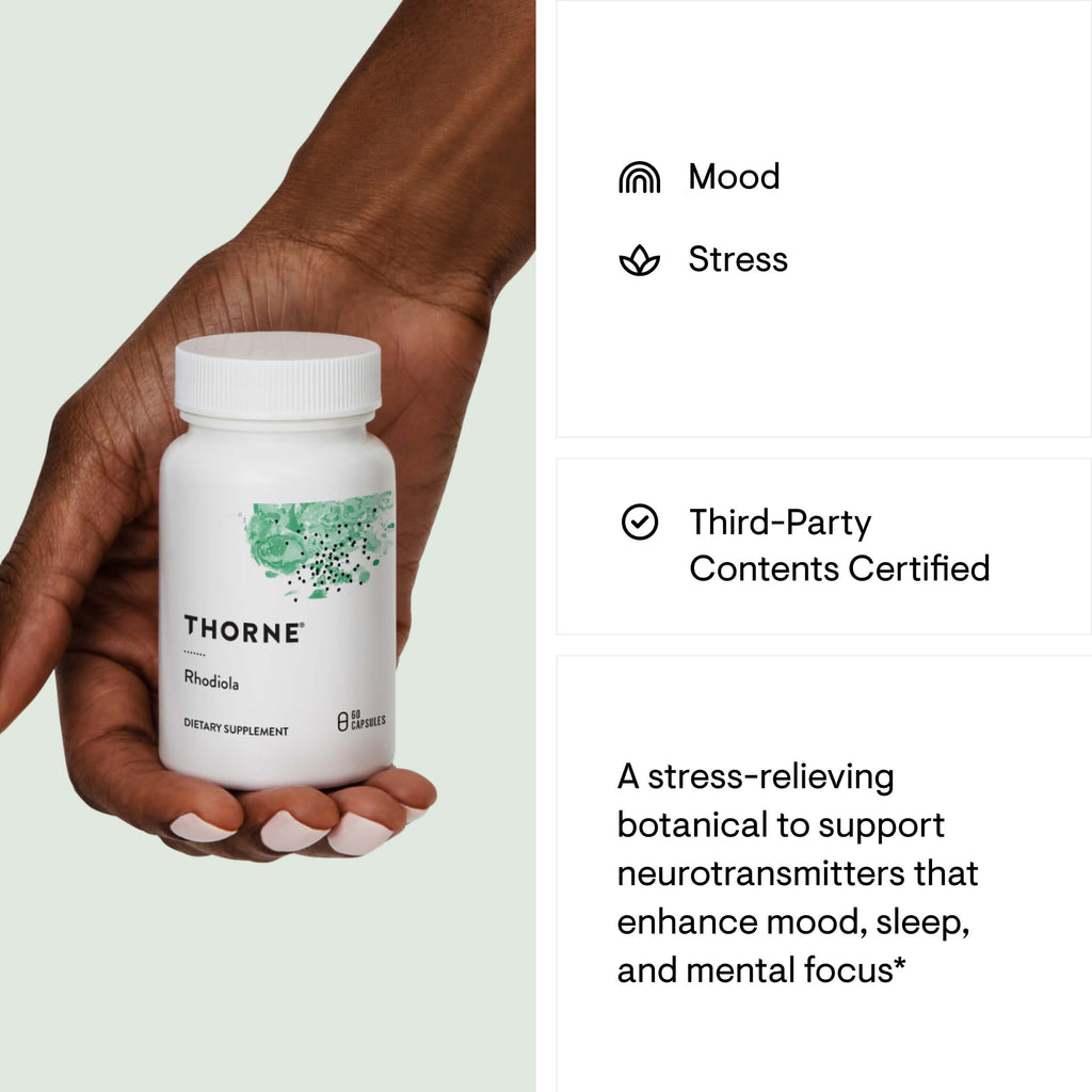 Hand holding a Thorne supplement bottle with product details on a light green background