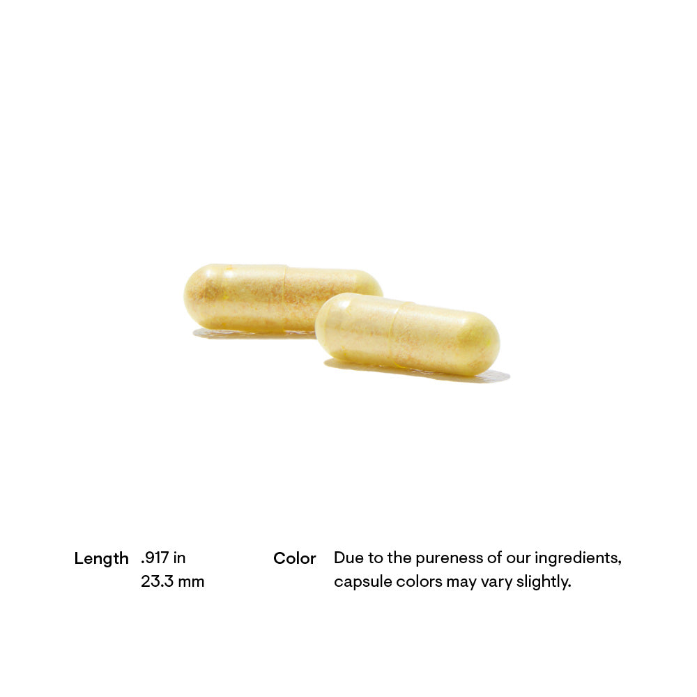 Two yellow capsules on a white background with text about dimensions and color variation.