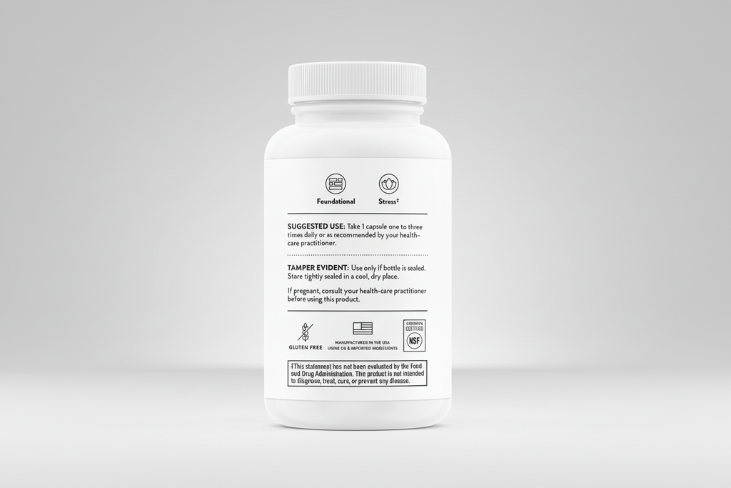 White supplement bottle with label on a black background