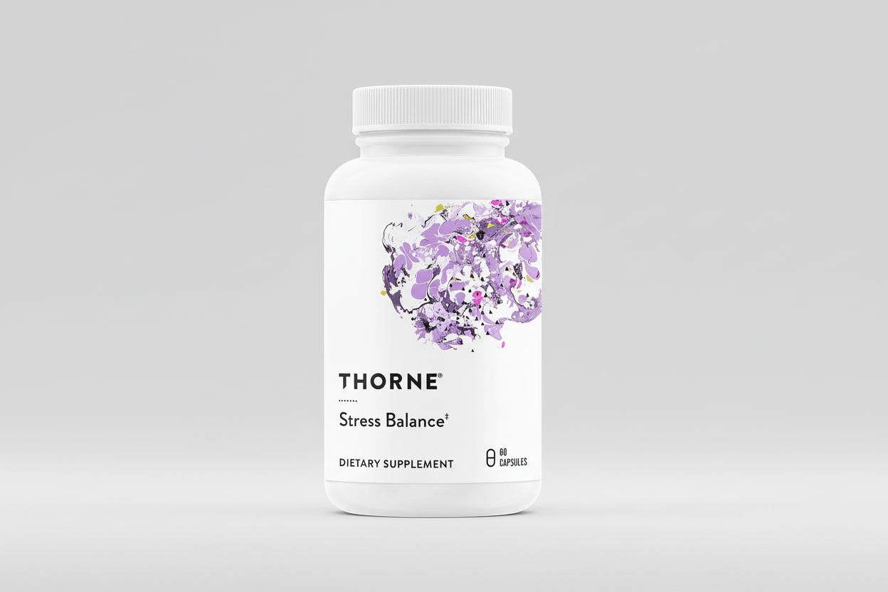 Thorne Stress Balance dietary supplement bottle on a black background