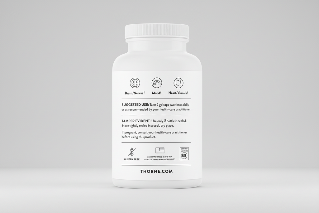 White supplement bottle with label on a black background