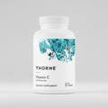 Thorne Vitamin C dietary supplement bottle on a white background