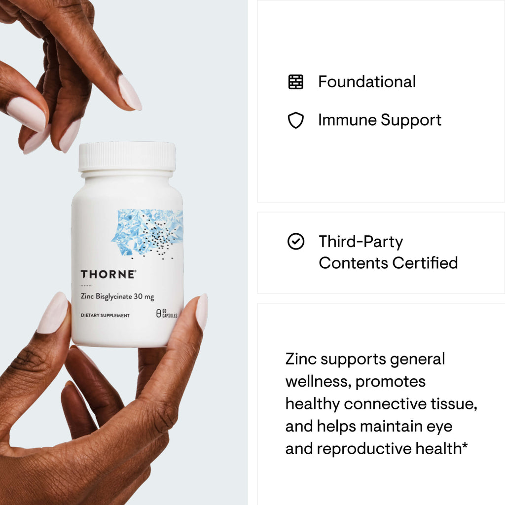 Thorne supplements bottle held by a hand with product details on a light gray background