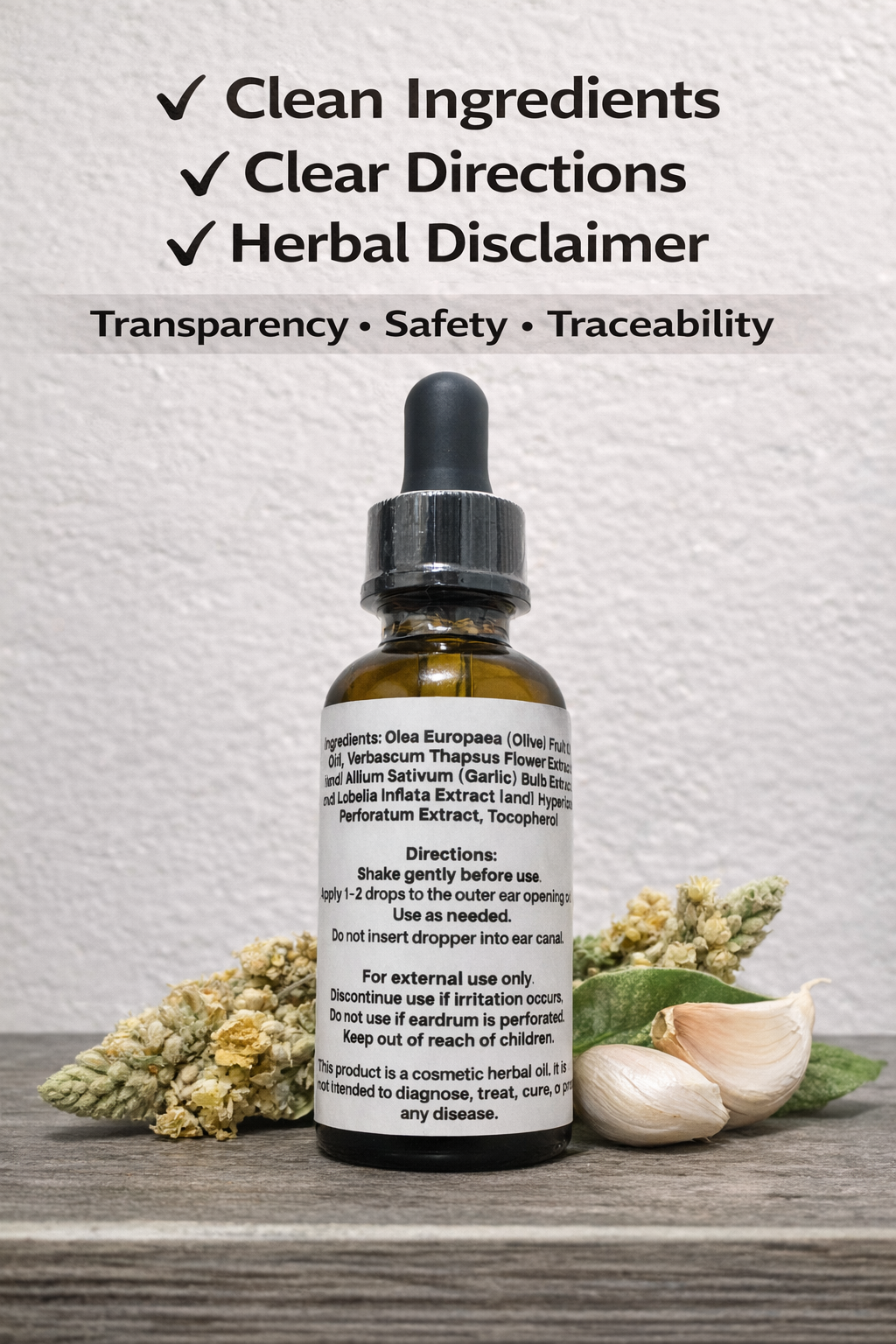 Bottle of herbal extract with dried herbs and garlic on a wooden surface, against a light gray background.