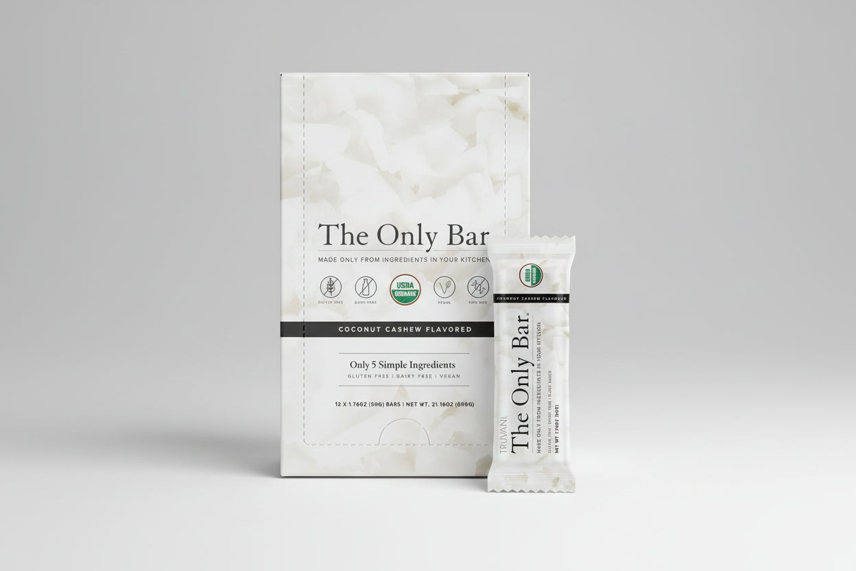 Packaging of 'The Only Bar' coconut cashew flavored snack bar on a white background