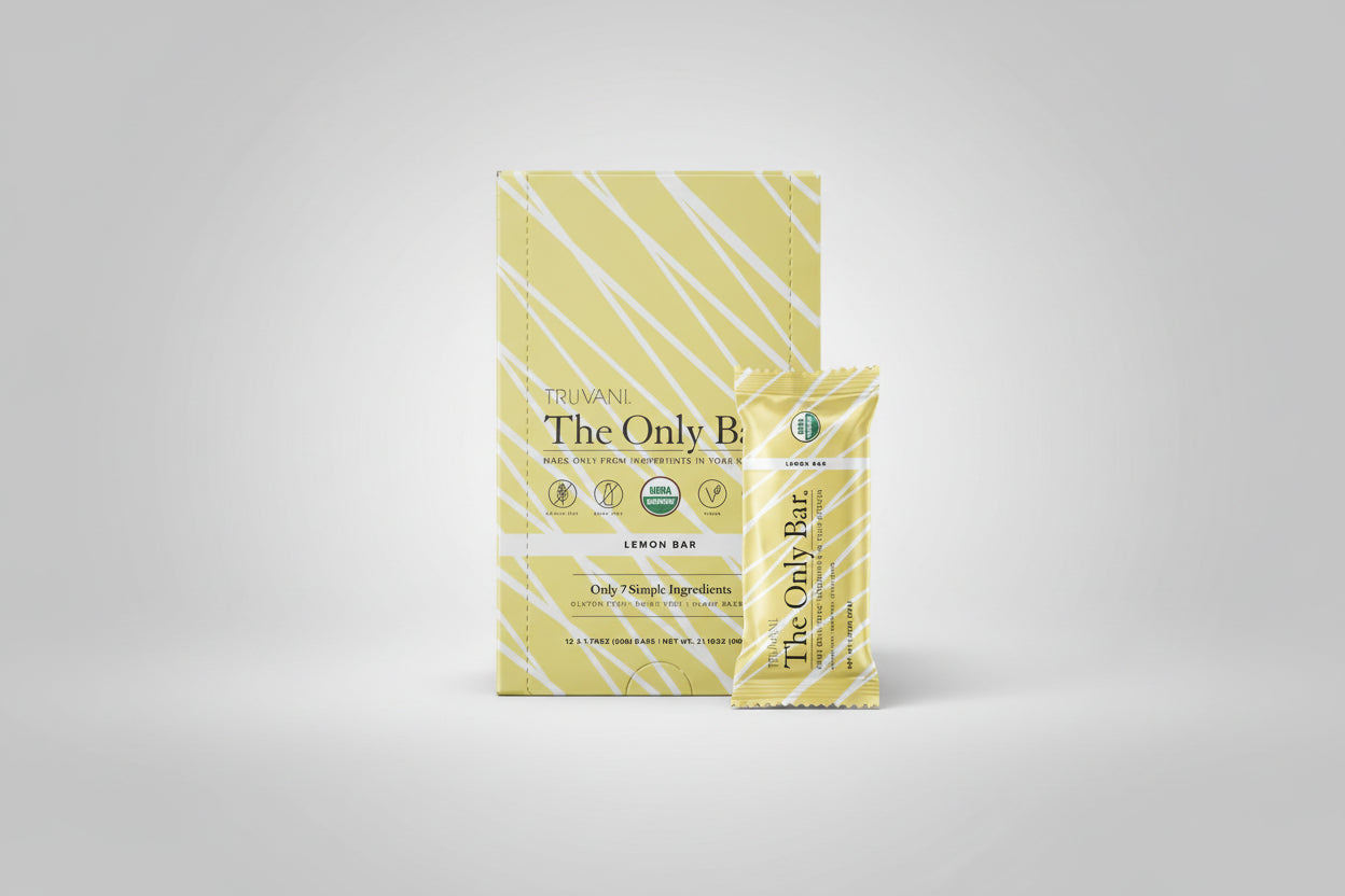 Yellow and white striped packaging of Truvani The Only Bar Lemon Bar on a white background