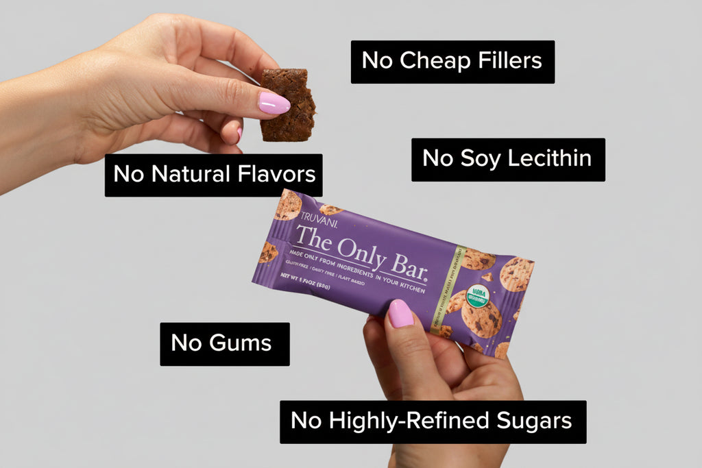 Person holding a 'The Only Bar' with text highlighting ingredients.