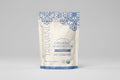 Truvani organic whey protein package with blue floral designs on a white background