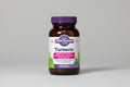 Oregon's Wild Harvest Turmeric supplement bottle with purple cap and label.