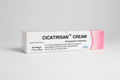 Cicatrisan cream packaging with pink and white design