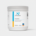 Xymogen Creatine supplement container on a white background
