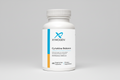 Supplement bottle labeled 'Xymogen Cytokine Balance' on a white background