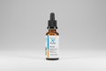 Xymogen Drainage supplement bottle with dropper on a white background