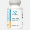 Xymogen Zinc + Copper supplement bottle on a white background