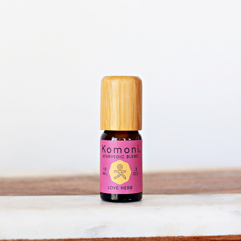 KOMONI Love Herb Essential Oil Blend, 10 ml, product packaging