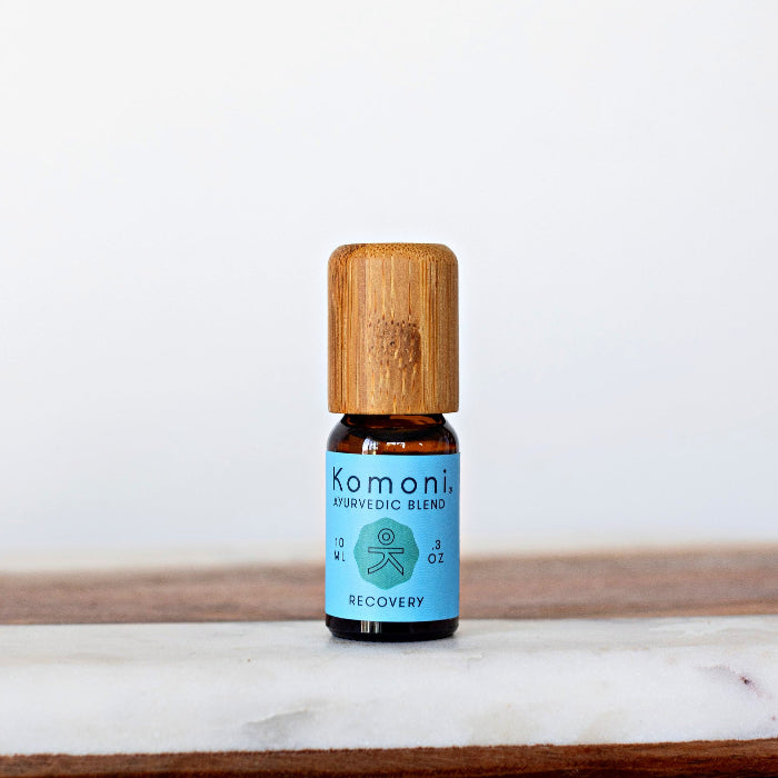 KOMONI Recovery Essential Oil Blend, 10 ml, product packaging